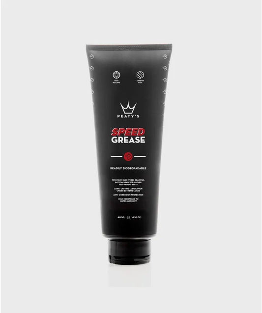 Peaty's Speed Grease 100g tube with black and orange branding showing high-performance bearing grease for race hubs and bottom brackets